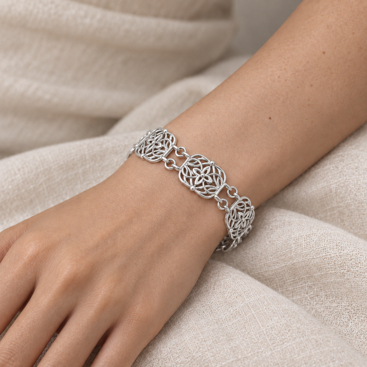 Floral openwork bracelet styled on the wrist