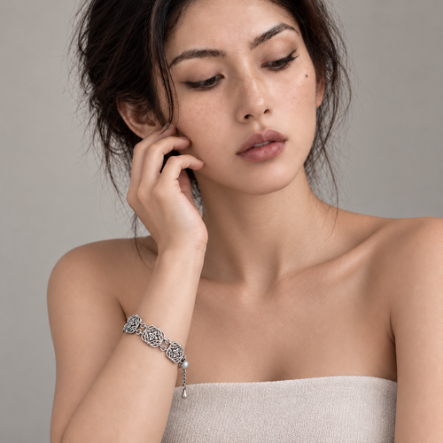 Model wearing the Botanical Filigree Bracelet