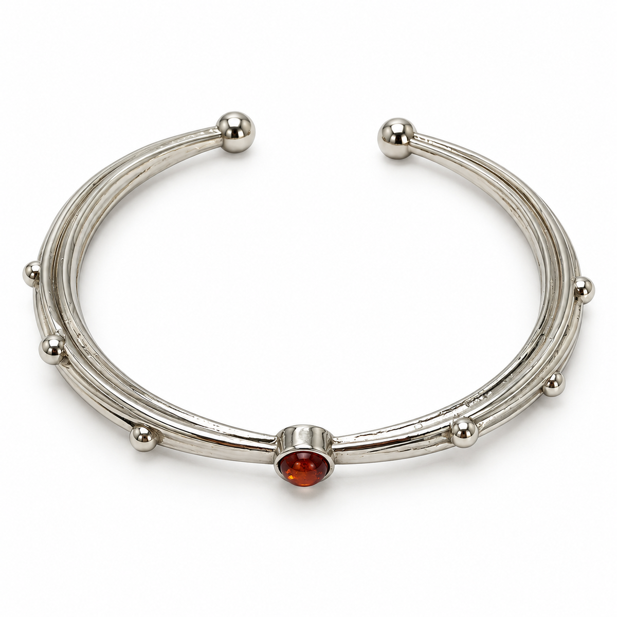 Ember Trace Cuff in electroplated alloy with cognac-red synthetic stone, top view