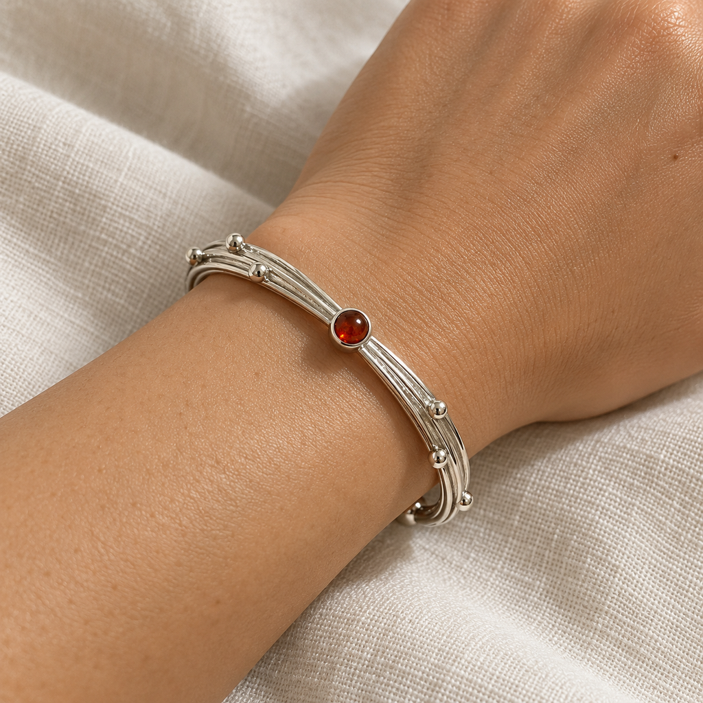 Ember Trace Cuff on wrist, AI-generated styling illustration